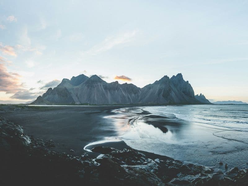 Black sand dunes and jagged mountains at Stokksnes