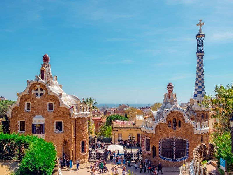 Gaudí’s mosaic buildings at Park Güell overlooking Barcelona